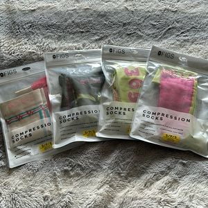Bulk lot of new unopened FIGS Compression socks.